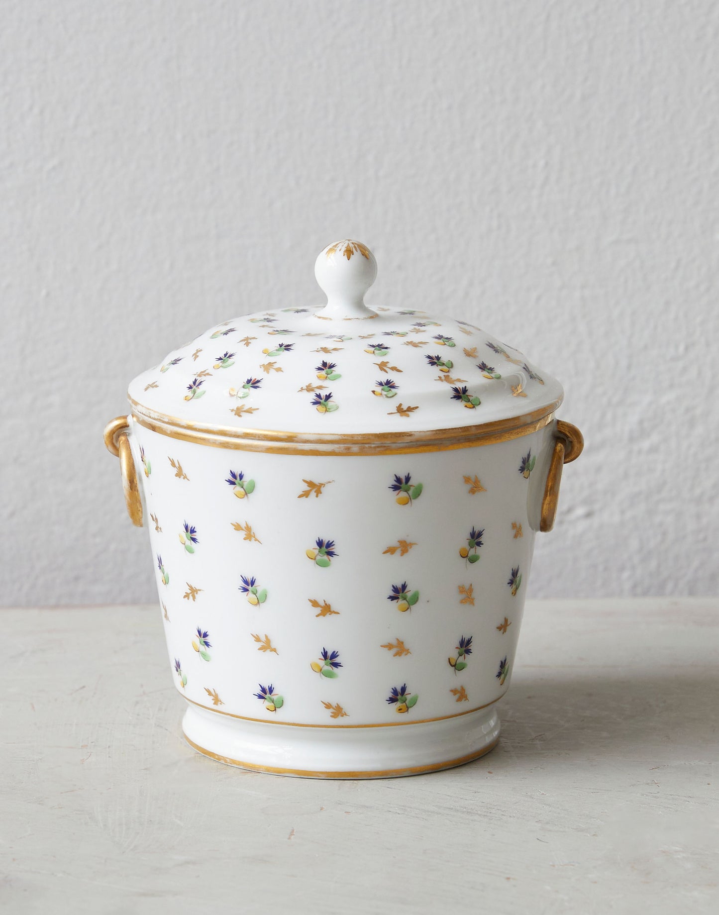 A 19th Century Porcelain Lidded Sugar Bowl Decorated with a Cornflower Sprig and Gold Leaves
