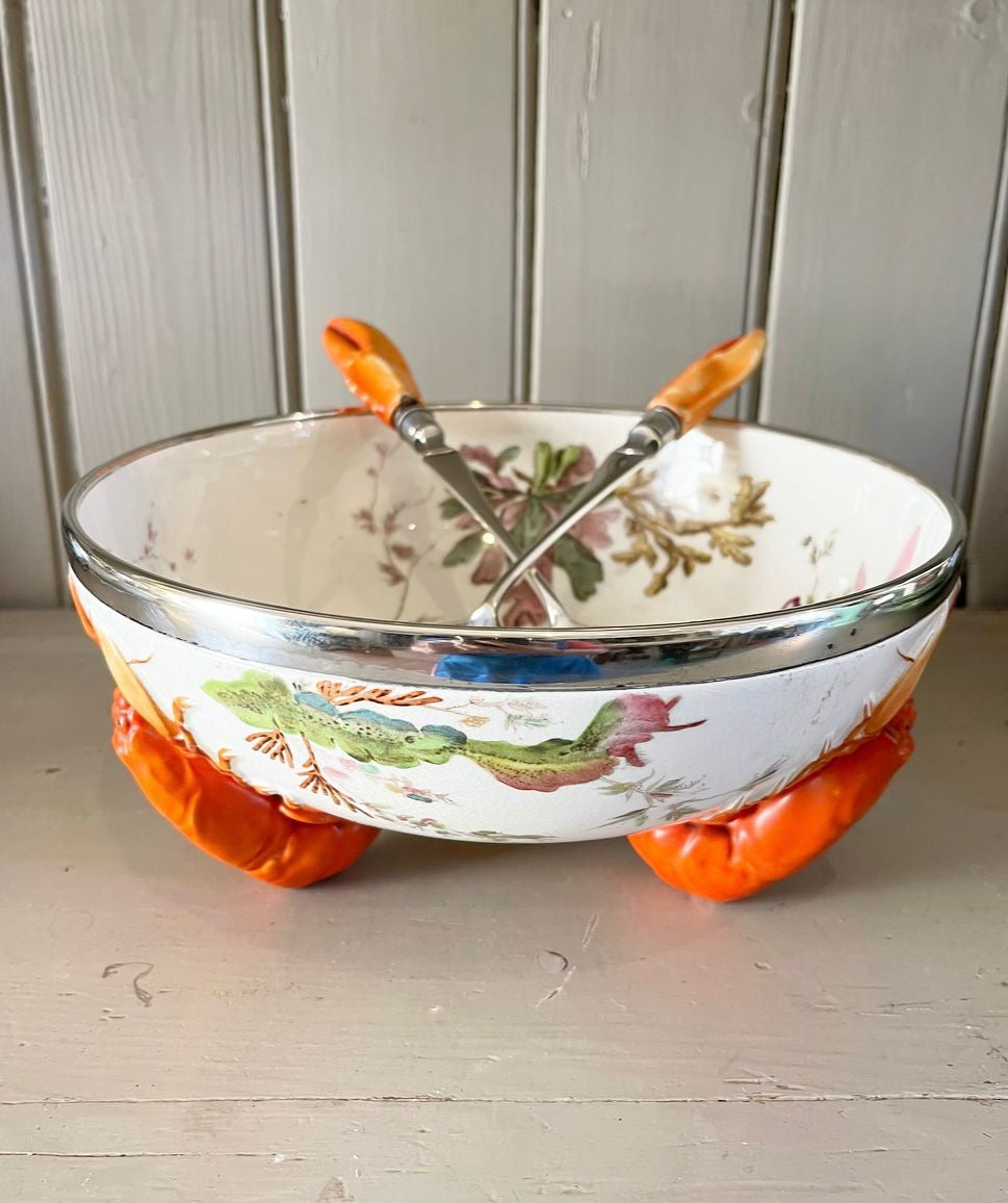 A late 19th Century Wedgwood Queen's Ware Lobster Bowl with a band of silver metal plate and silver plated servers with lobster claw form handles.