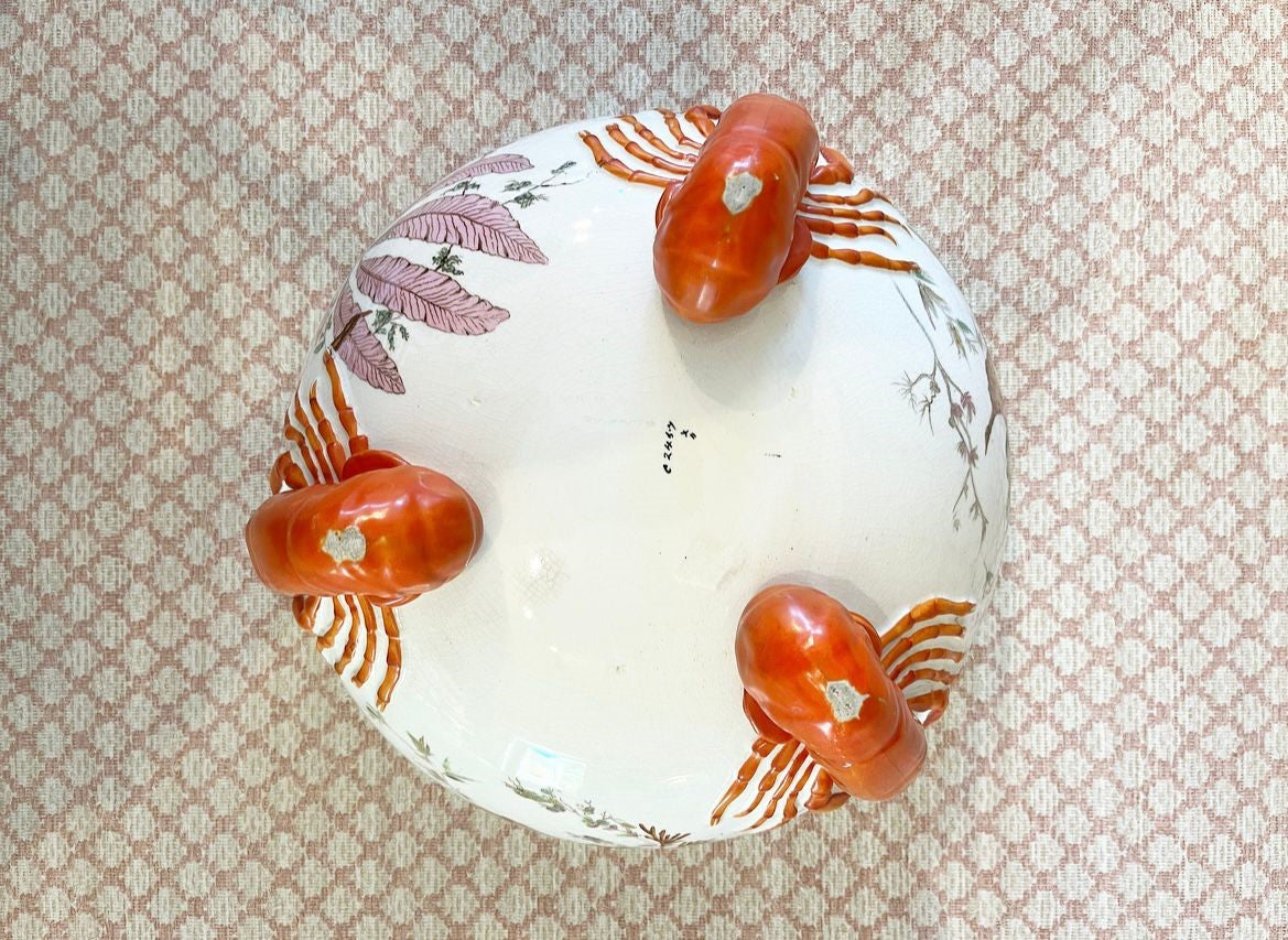 A late 19th Century Wedgwood Queen's Ware Lobster Bowl with a band of silver metal plate and silver plated servers with lobster claw form handles.
