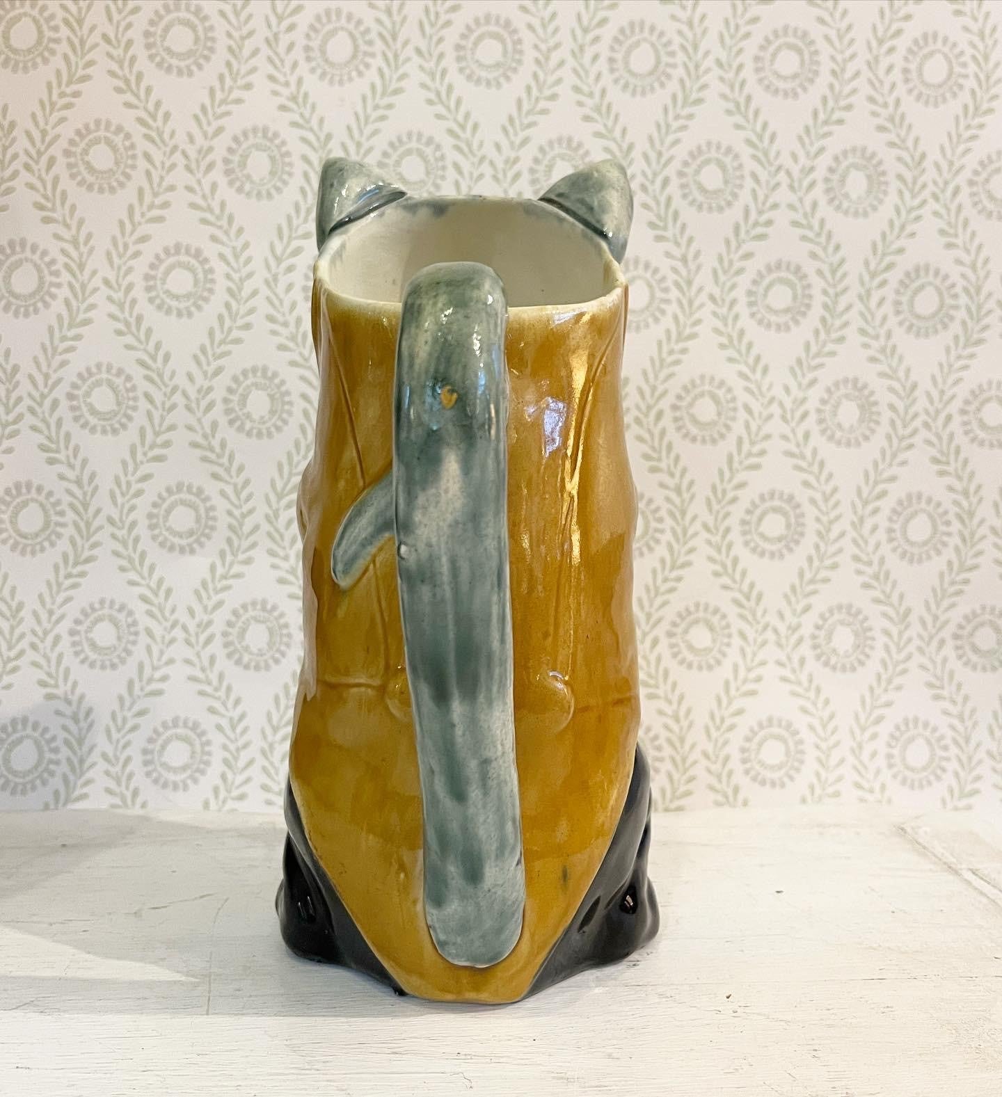A French Majolica Barbotine Absinthe Jug of a Cat Night-Club Singer with Mandolin