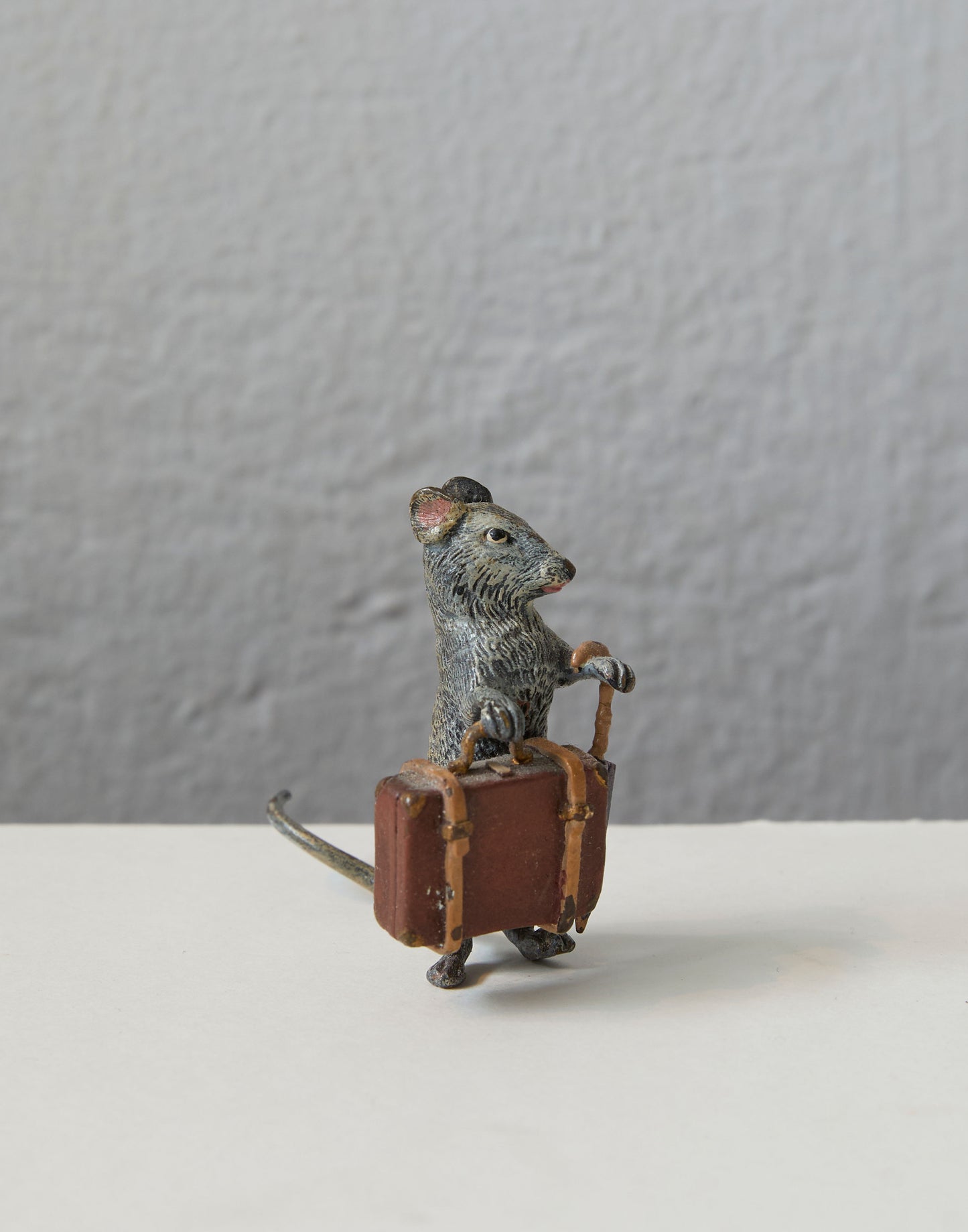 A Set of Three Early 20th Century Cold Painted Models of Pugs; Mouse and Two Wrestling Cats