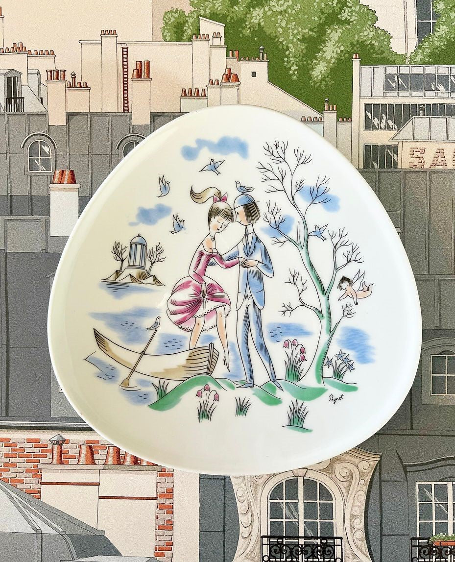 A Collection of Ten Vintage Pieces of Rosenthal Porcelain Decorated with Scenes of Lovers by Raymond Peynet