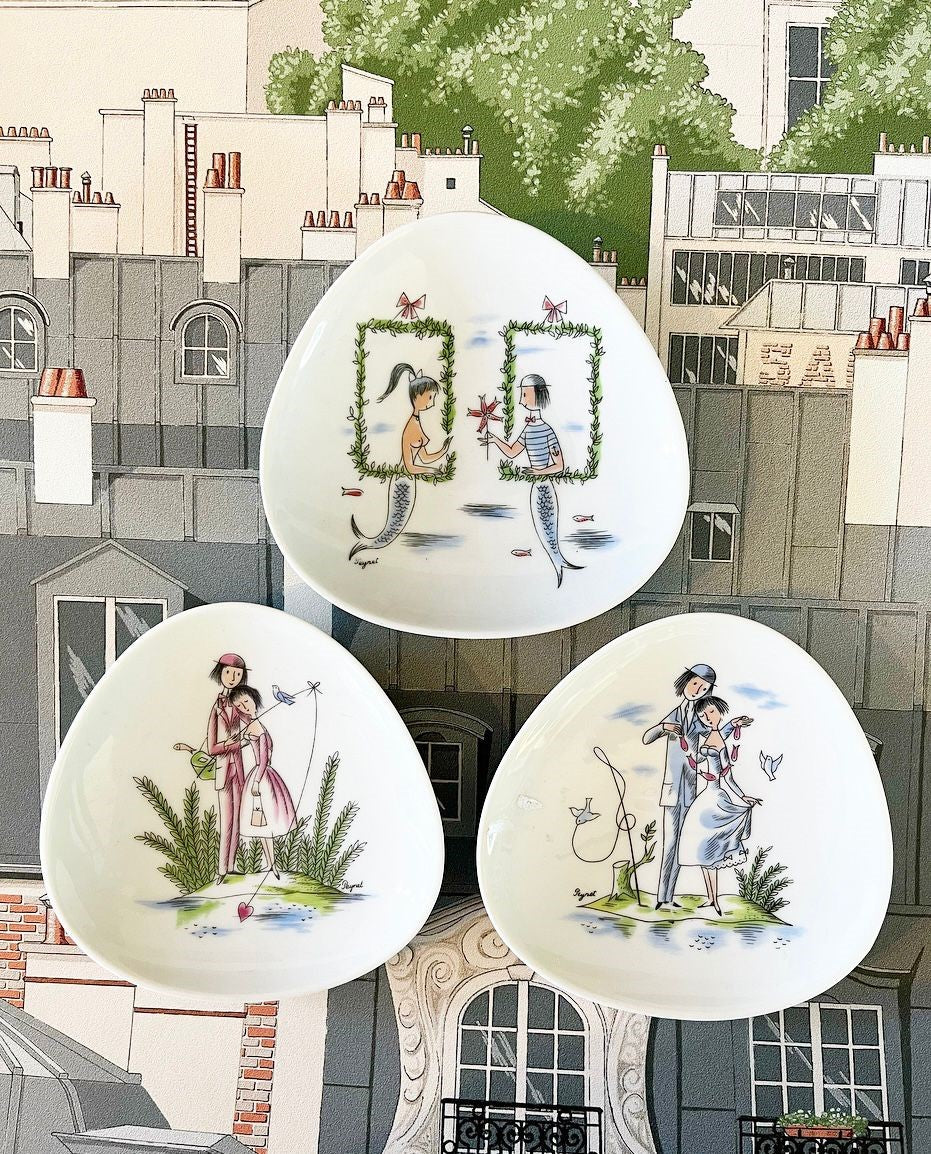 A Collection of Ten Vintage Pieces of Rosenthal Porcelain Decorated with Scenes of Lovers by Raymond Peynet