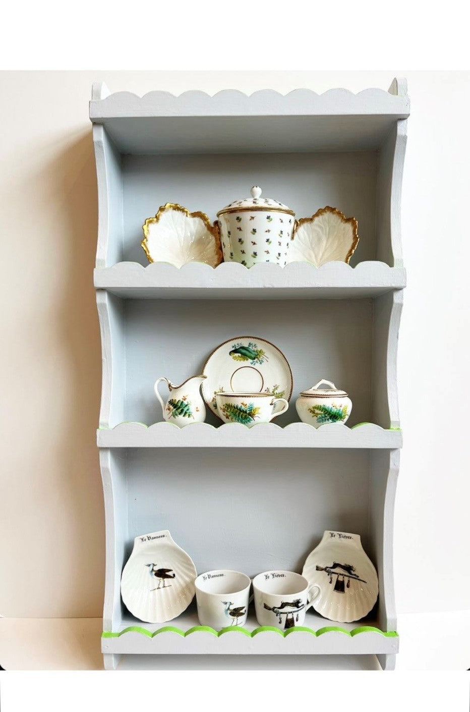A Hand-Painted Vintage Four-tiered Shelving Unit with Scalloped Edge