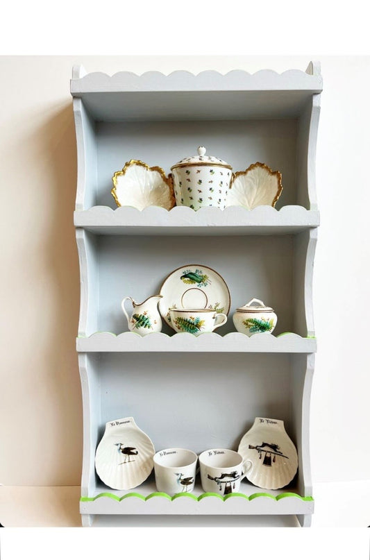 A Hand-Painted Vintage Four-tiered Shelving Unit with Scalloped Edge