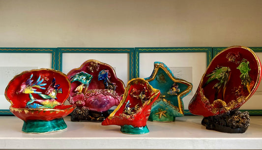 A Group of French Vintage Glazed Shells with Underwater Scenes