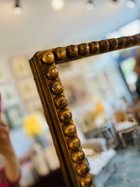 A Gold Bobble Frame Fitted with Antique-Effect Mirror