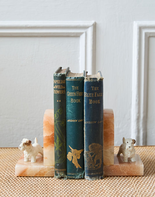 A Pair of Art Deco Onyx Bookends Surmounted by Cold Painted Spelter Models of Scottish Terriers