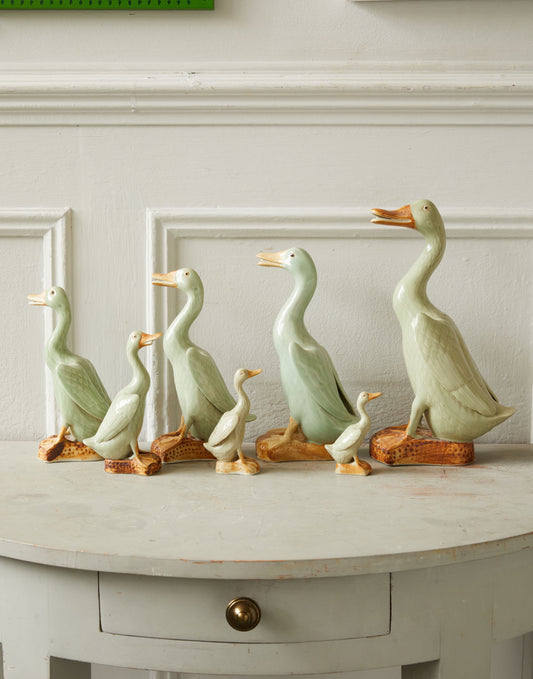 A Graduated Set of Seven Chinese-Export Celadon Glazed Figures of Standing Ducks