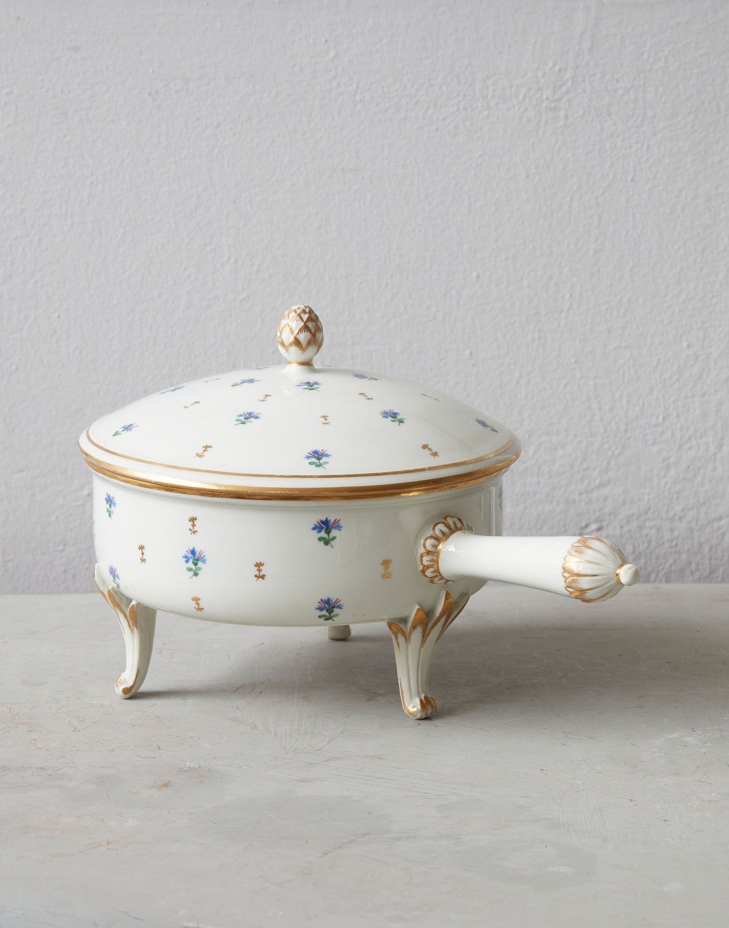 A 19th Century Royal Vienna Porcelain Lidded Pot Decorated with a Cornflower Sprig with a Handle and Cabriole Legs