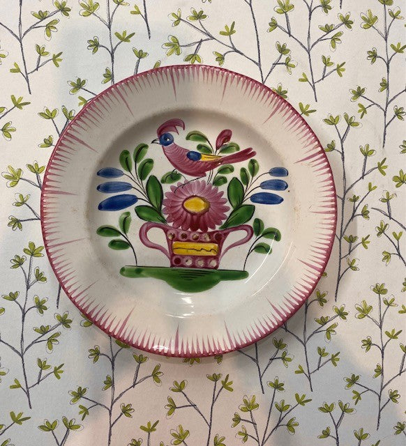 A Collection of Eleven 19th Century French Faience Plates Decorated with Flowers and Birds