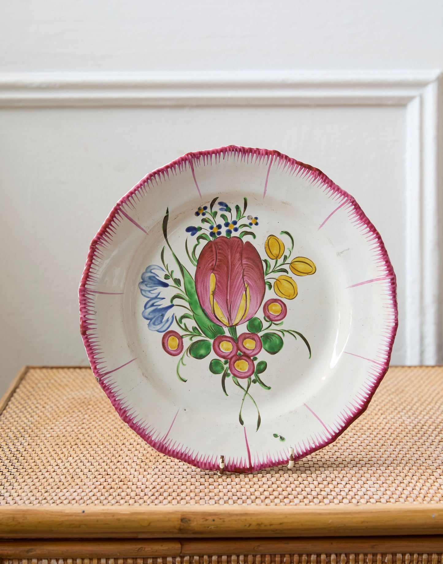 A Collection of Eleven 19th Century French Faience Plates Decorated with Flowers and Birds