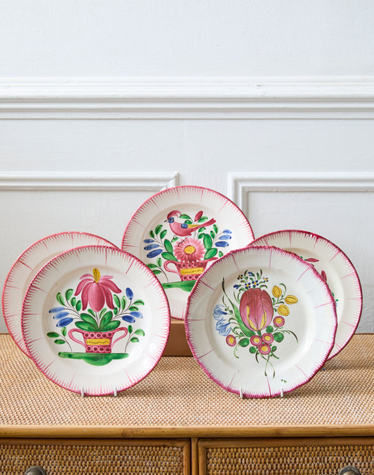 A Collection of Eleven 19th Century French Faience Plates Decorated with Flowers and Birds