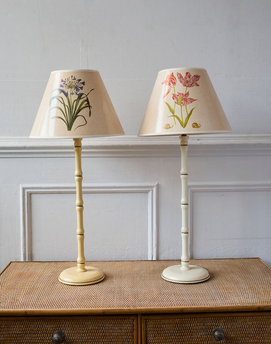 Two pairs of Vintage Ivory and Gilt Painted Carolyn Sheffield Table Lamps with Floral and Insect Motifs to the Shades