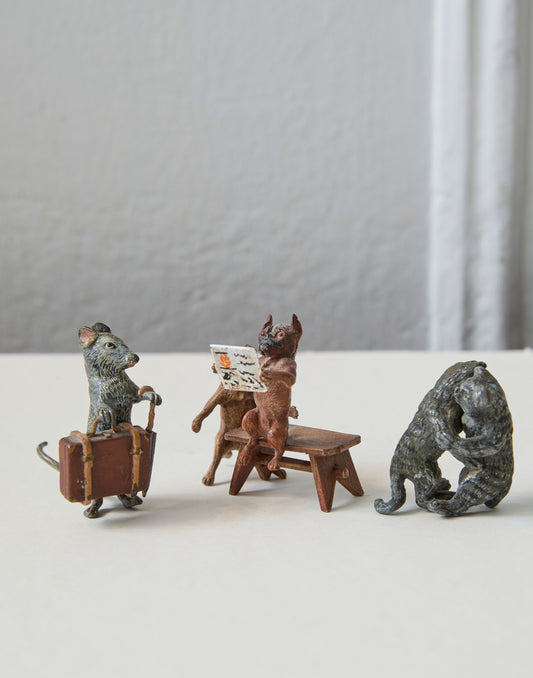A Set of Three Early 20th Century Cold Painted Models of Pugs; Mouse and Two Wrestling Cats