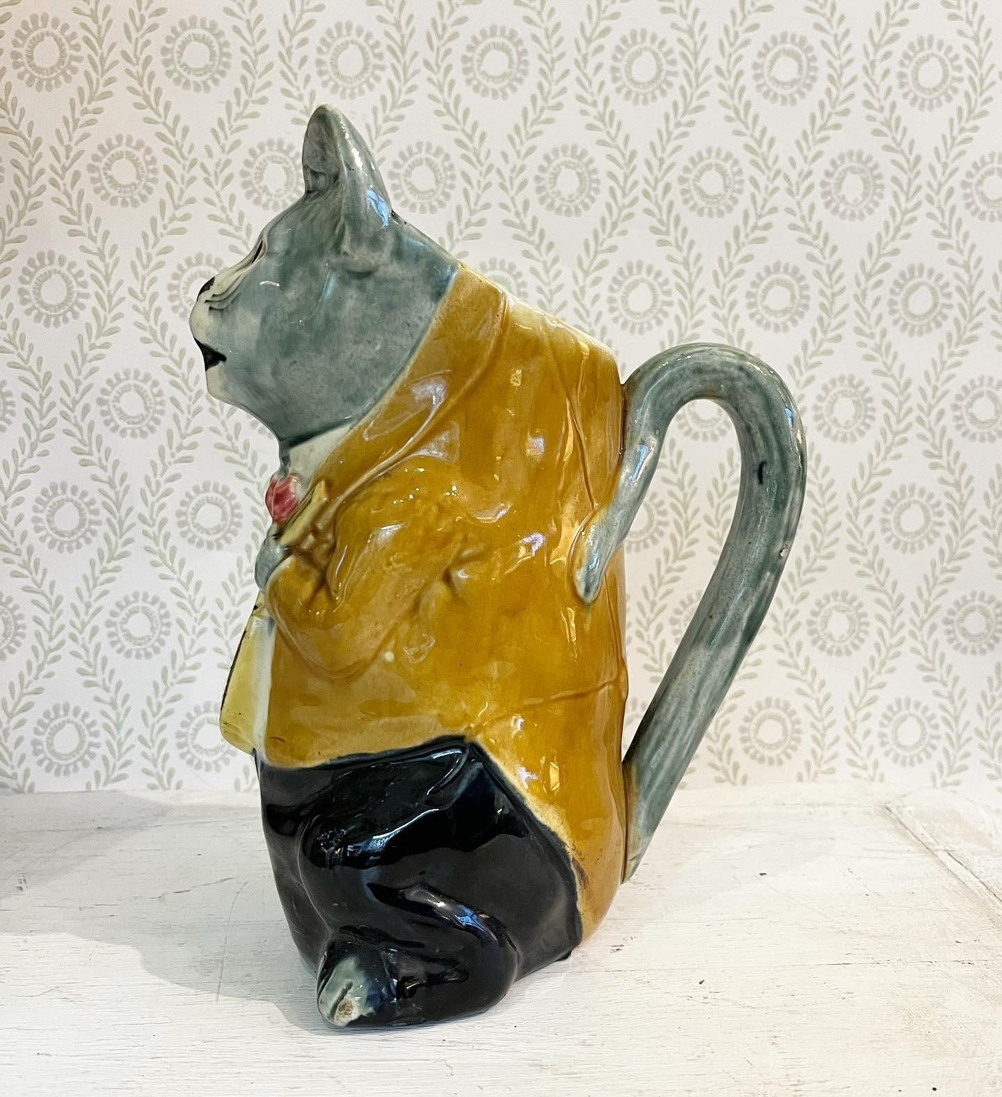 A French Majolica Barbotine Absinthe Jug of a Cat Night-Club Singer with Mandolin