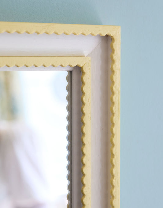 A Double Scallop Mirror Handpainted in Farrow & Ball Dayroom Yellow and Wevet