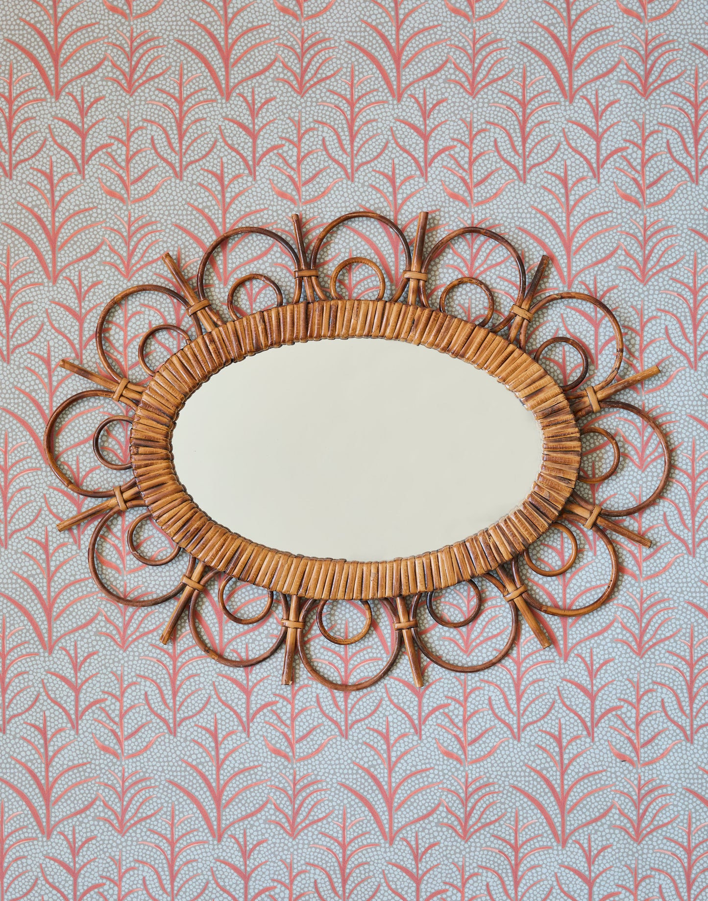 A Decorative French Mid-Century Rattan Mirror