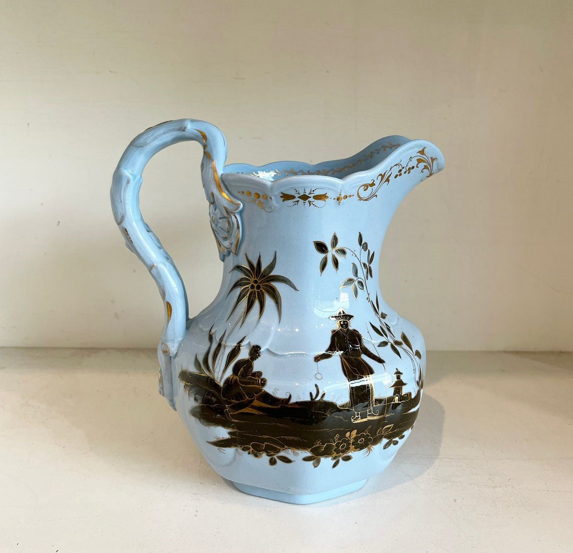 A Rare Pale Blue Stoneware Pitcher Jug with Gilt Enriched Black Enamel with Chinoiserie Figures by William Ridgway