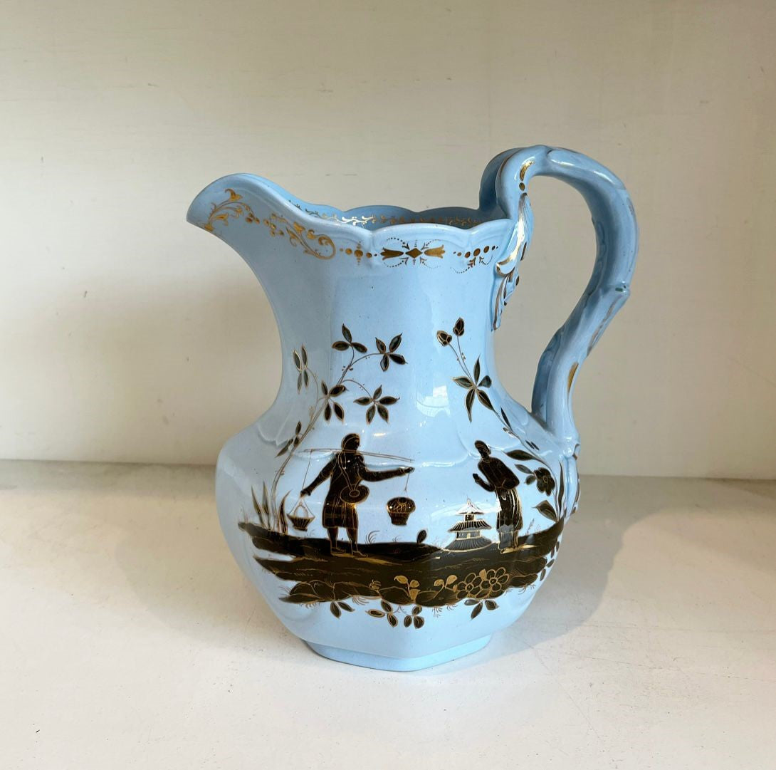 A Rare Pale Blue Stoneware Pitcher Jug with Gilt Enriched Black Enamel with Chinoiserie Figures by William Ridgway