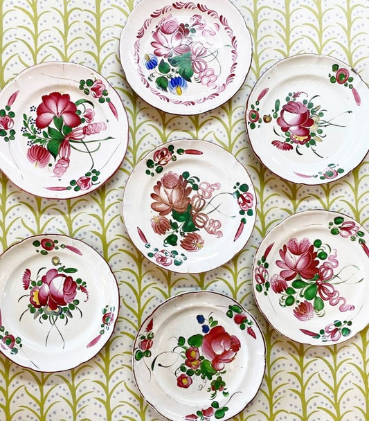 A Set of Seven Antique French Faience Floral Plates circa 1800s