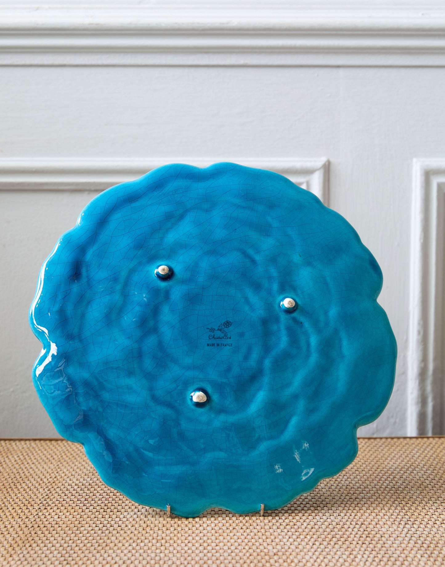 A French Charolles Faience Art Nouveau Plate with Moulded Peony Flowerhead Decoration and Turquoise Glaze