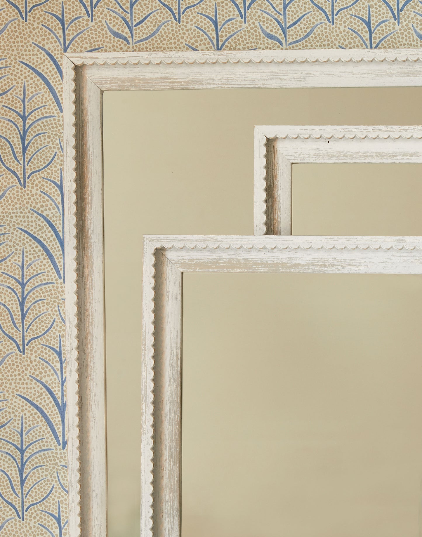 A White Scalloped Mirror Available in Three Sizes