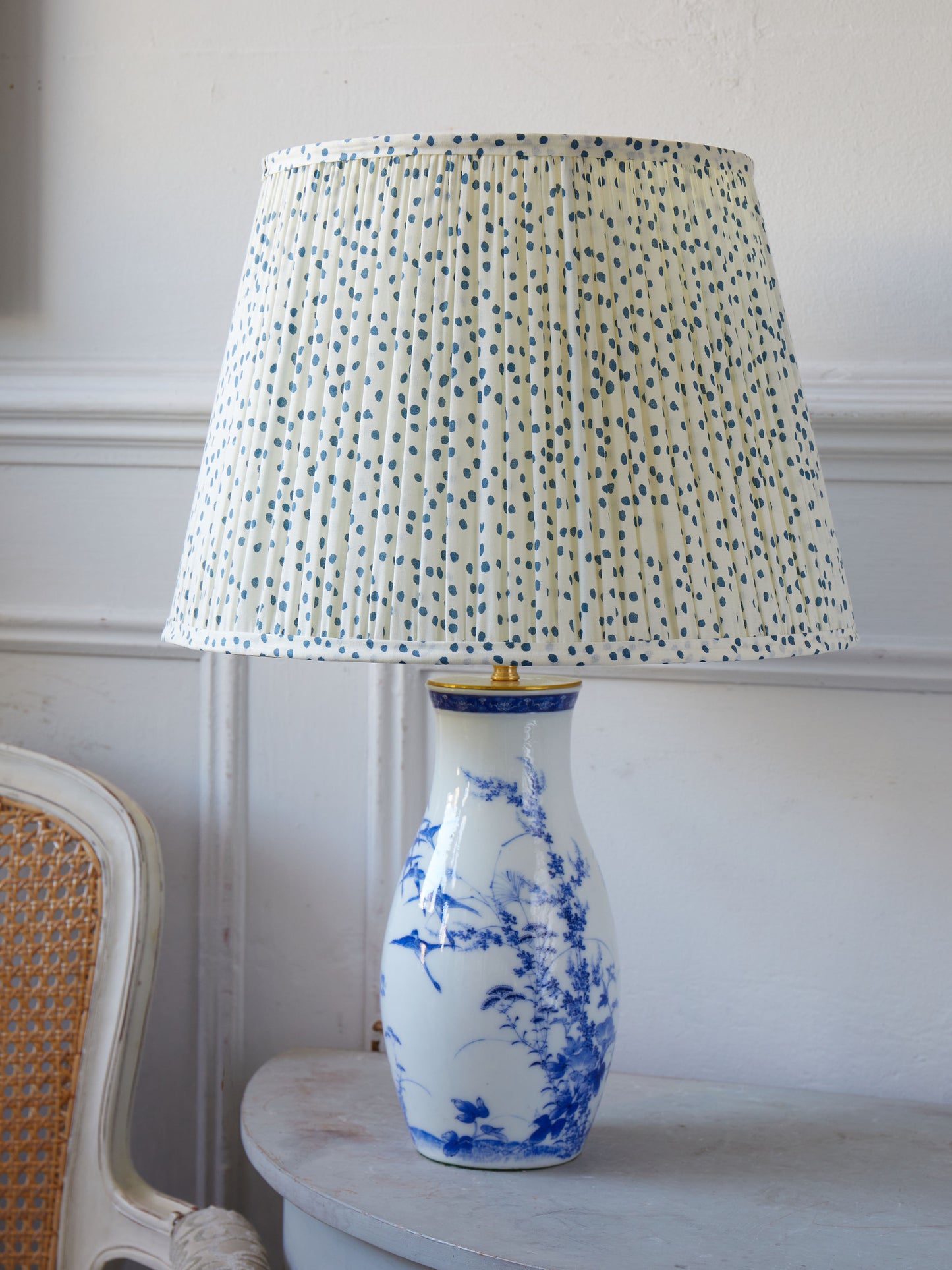 A Decorative Blue and White Chinoisserie Lamp with Polka Dot Shade