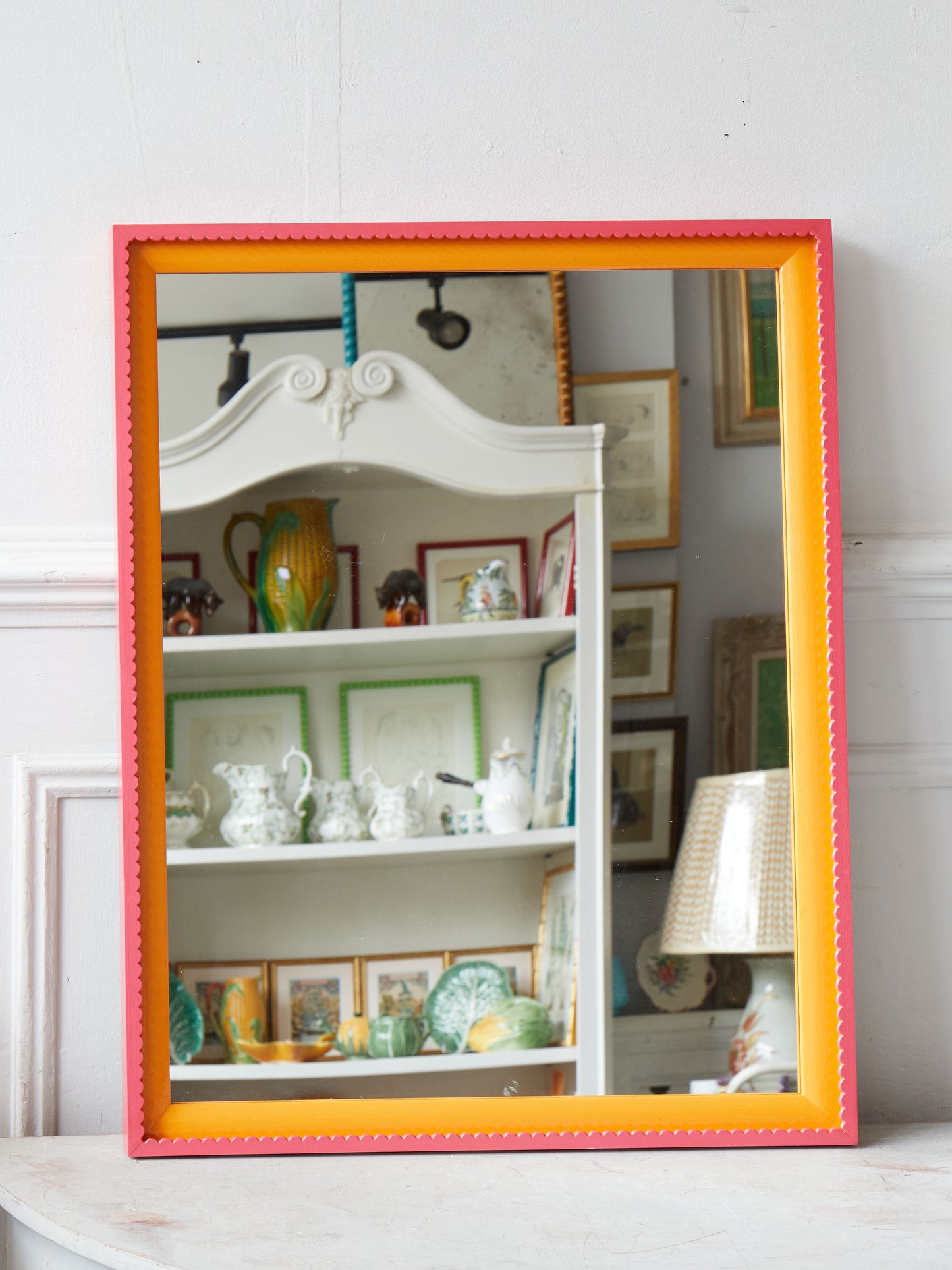 A Medium Scallop Framed Mirror Hand-Painted in Leather and Marigold by Little Greene Paint Company