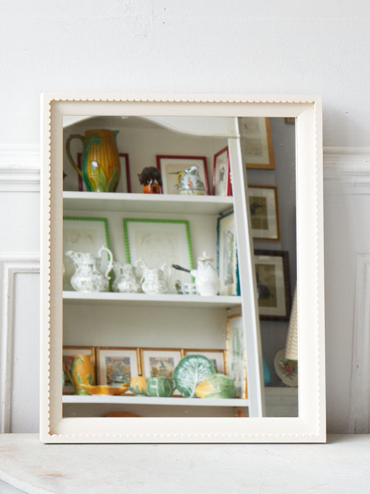 A Small Scallop Framed Mirror Hand-painted in Julie's Dream by Little Greene Paint Company